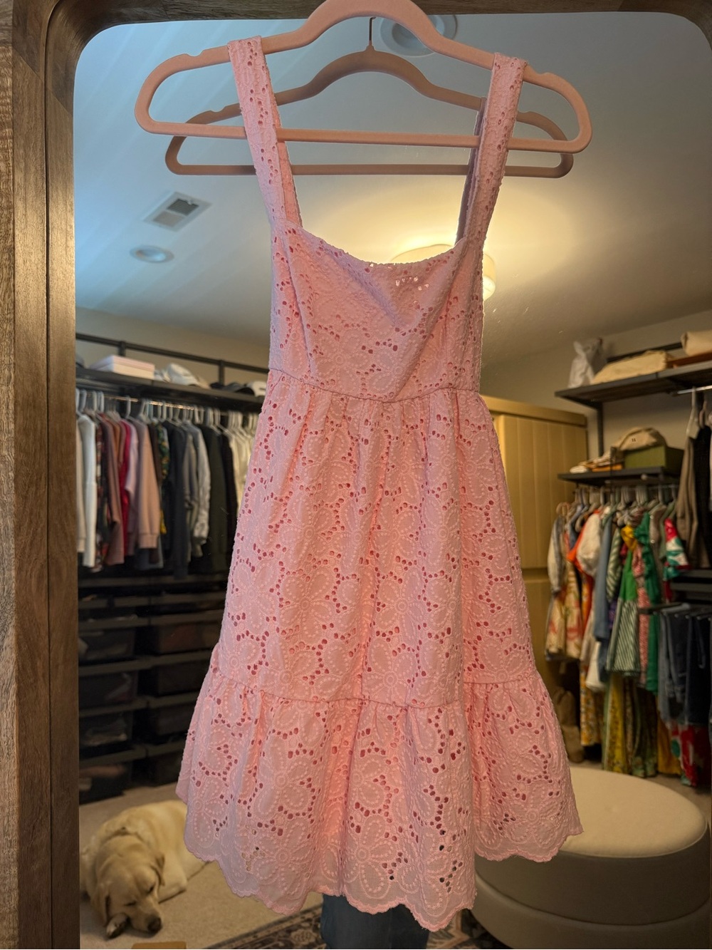 Pink eyelet mini dress with tie back and cute ruffle detail